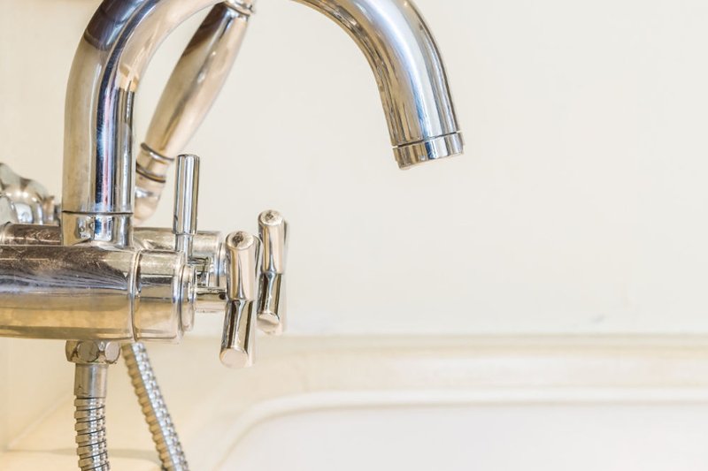 A new kitchen mixer tap being fitted in a Sunderland home